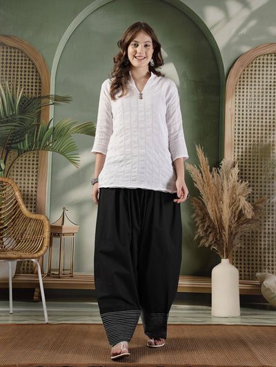 Black solid Farshi Salwar with intricate thread work for ethnic occasions.