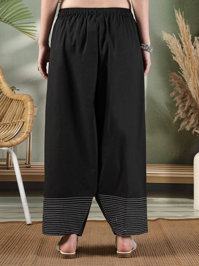 Black solid Farshi Salwar with intricate thread work detailing, offering traditional elegance and comfort.