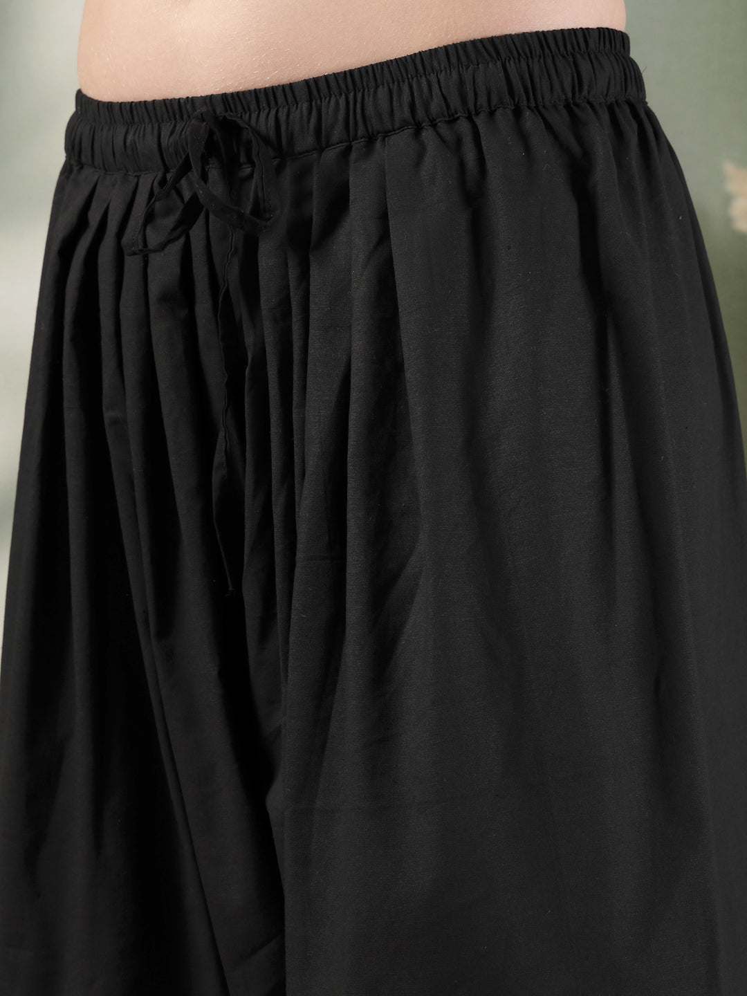 Black Solid Thread Work Farshi Salwar with intricate detailing and elegant flow.