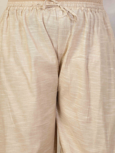 Women solid khadi cotton afghani salwar with elasticated waistband and drawstring closure.