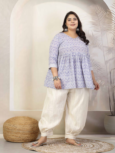Women wearing a design cotton lurex loose fit Afghani salwar with elasticated waistband.