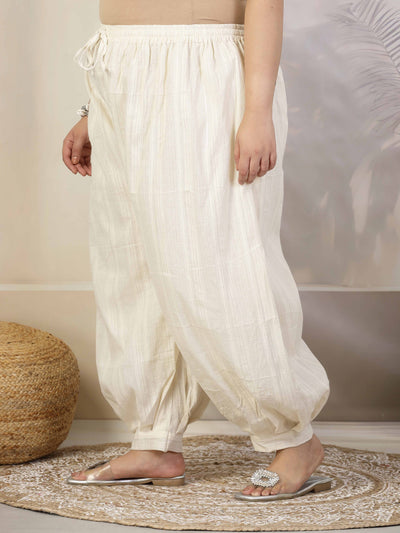 Women self design cotton lurex loose fit Afghani salwar with elasticated waistband and drawstring closure.
