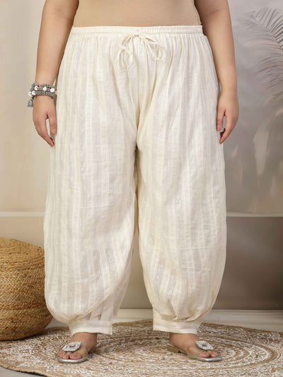 Women self design cotton lurex loose fit Afghani salwar with elasticated waistband and drawstring closure.