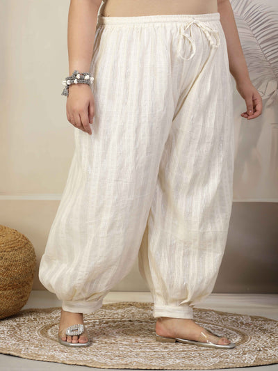 Women self design cotton lurex loose fit Afghani salwar with elasticated waistband and drawstring closure.
