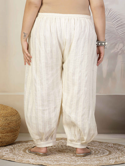 Women self-design cotton lurex loose fit Afghani salwar with elasticated waistband and drawstring closure.