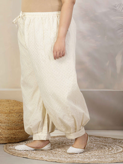 Women self design cotton lurex loose fit Afghani salwar with elasticated waistband and drawstring closure.