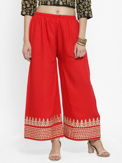 Red Gotta Patti Rayon Palazzo with elastic waistband and flared cut.
