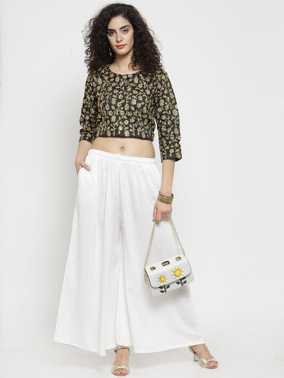 Off-White Solid Rayon Sharara for women paired with a patterned top.
