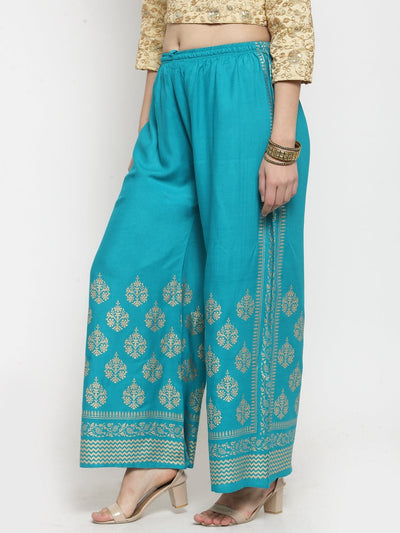 Turquoise printed rayon palazzo with elegant pattern design.