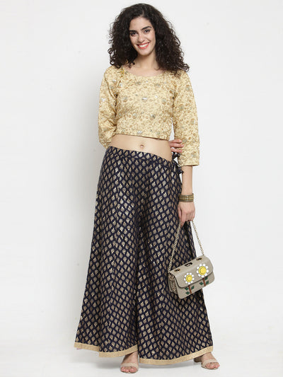 Navy blue printed rayon sharara with ethnic patterns, paired with a beige top.