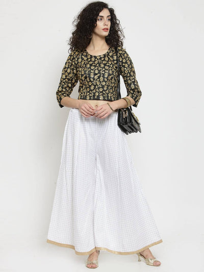 White printed rayon wide leg palazzo with ethnic charm and stylish silhouette.