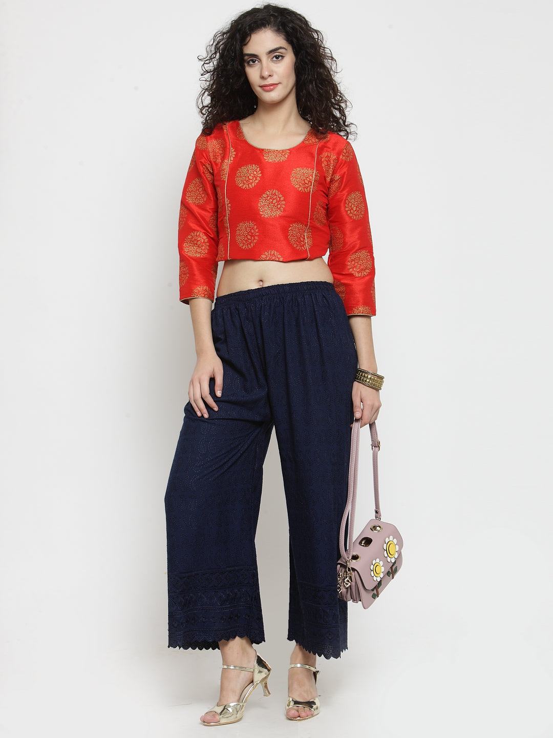 Navy Blue Full Chikankari Rayon Palazzo worn by a woman with a red top.