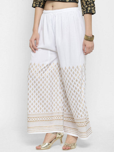 White printed rayon palazzo with gold patterns for a casual classy look.