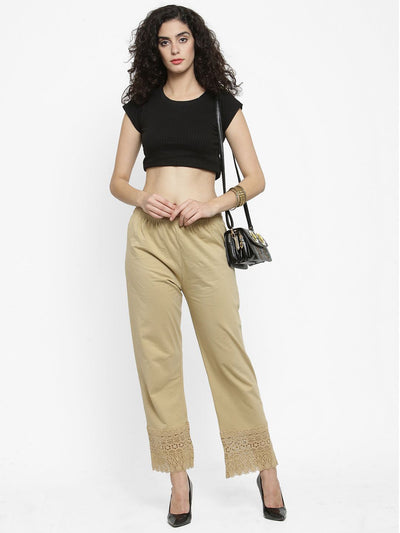 Fawn Viscose Lace Palazzo paired with a black crop top and heels.