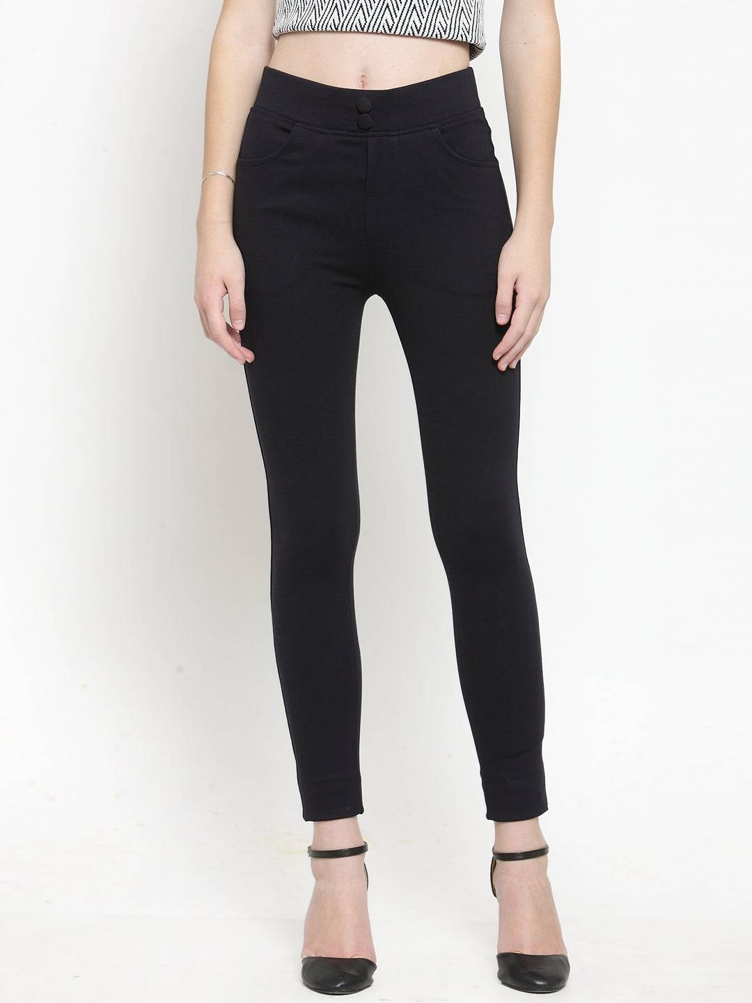 Navy Blue Solid Jeggings paired with crop top and high heels.