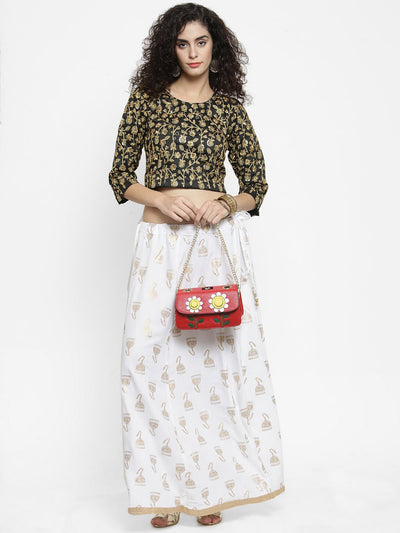 White printed maxi skirt with multicolor design and rayon fabric.