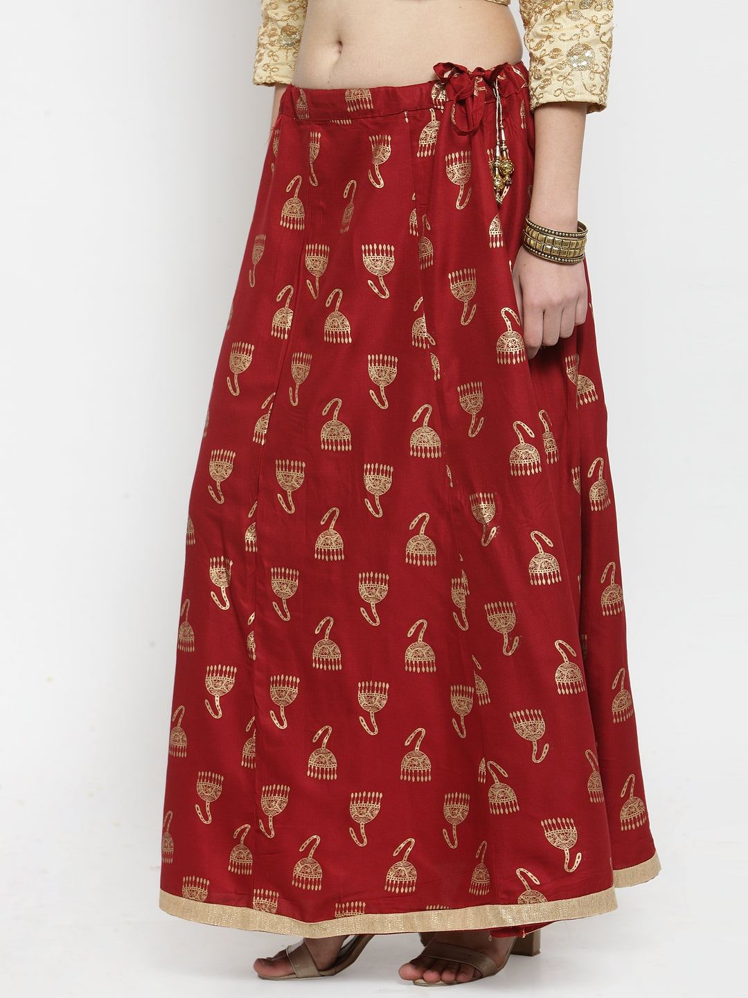 Maroon printed maxi skirt made from rayon fabric with stylish pattern design.