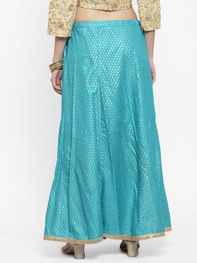Turquoise printed rayon maxi skirt with geometric patterns.