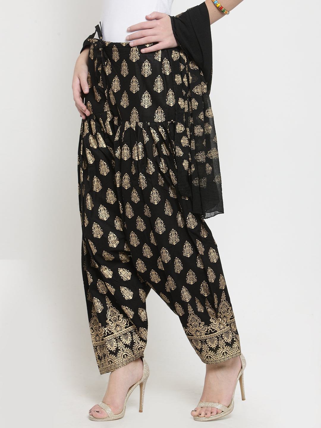 Black printed salwar dupatta set made from cotton with an elegant design.