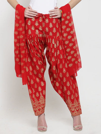 Red printed salwar dupatta set in cotton with bright fashionable design.