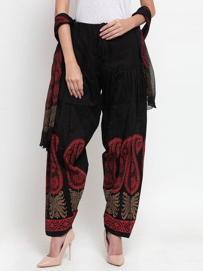 Black printed cotton salwar dupatta set with red patterns.