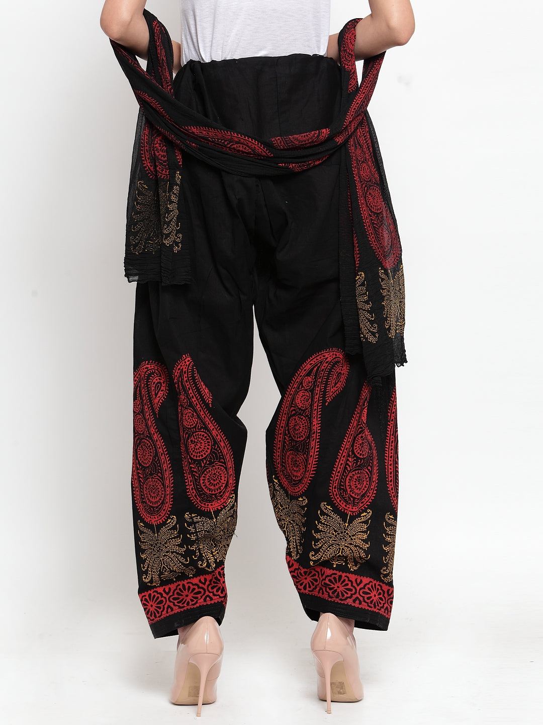 Black printed salwar and dupatta set in cotton from Clora, styled with intricate patterns.