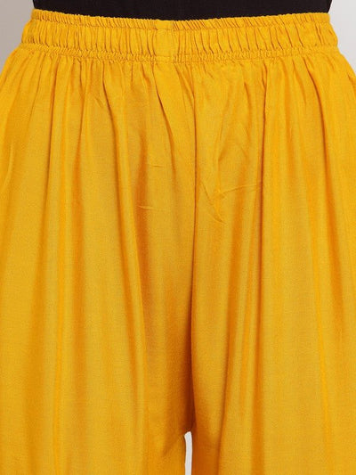 Mustard flared solid gharara with golden gota hem, made from lightweight rayon fabric.