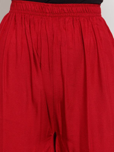 Maroon flared solid gharara with golden gota detailing, rayon fabric.