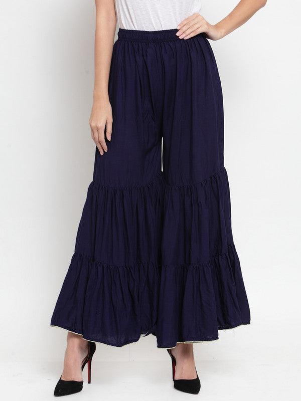 Navy blue flared solid gharara with golden gota hem detailing made from rayon fabric.