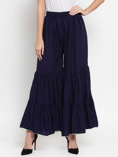 Navy blue flared solid gharara with golden gota hem detailing made from rayon fabric.