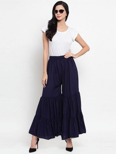 Navy blue flared solid gharara with golden gota hem, made from lightweight rayon fabric.