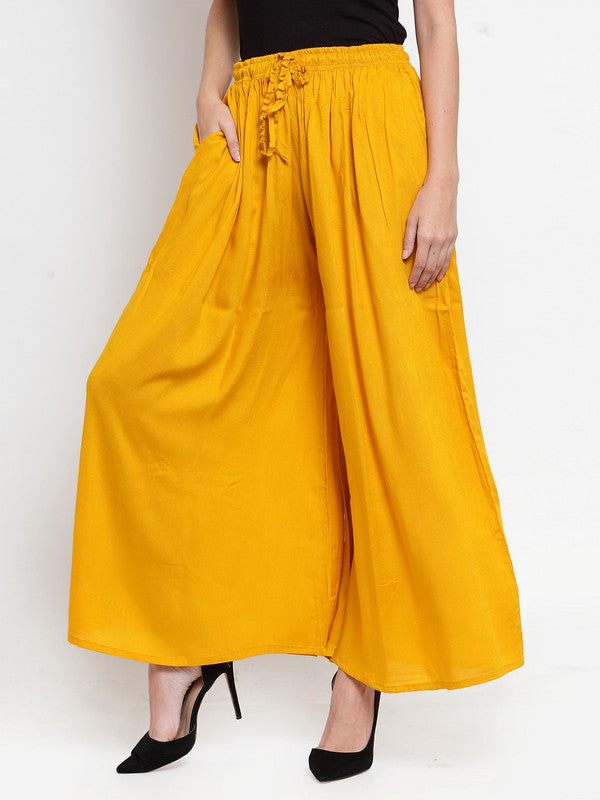Mustard solid rayon sharara for women, casual and fashionable.