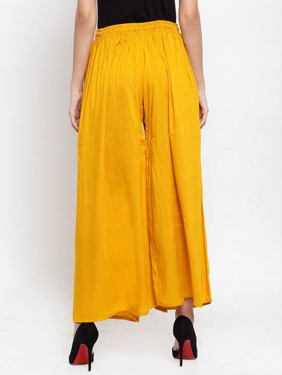 Mustard Solid Rayon Sharara for women, providing a stylish and casual look.