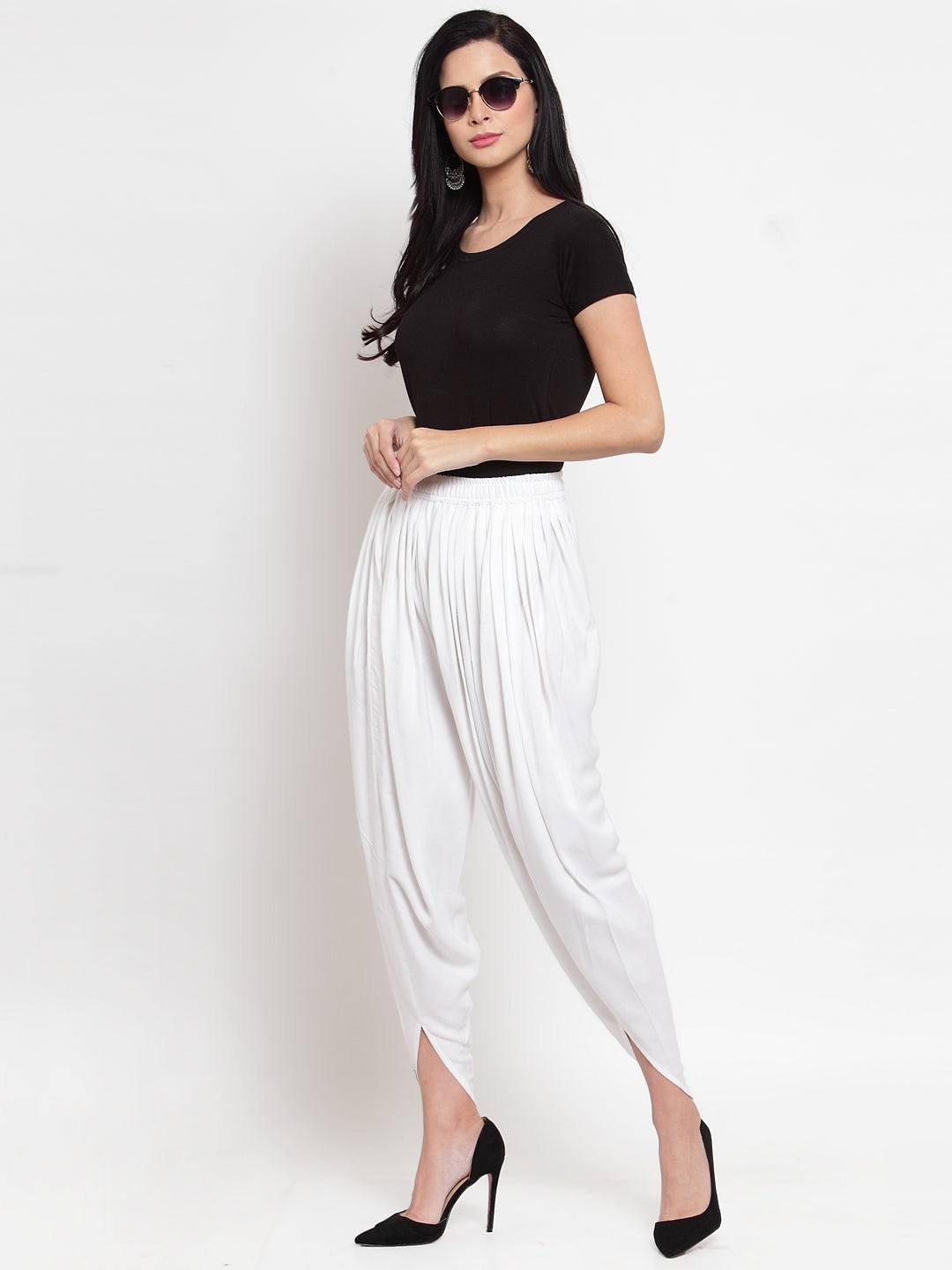 White Rayon Dhoti Salwar with solid pattern and elasticated waistband.
