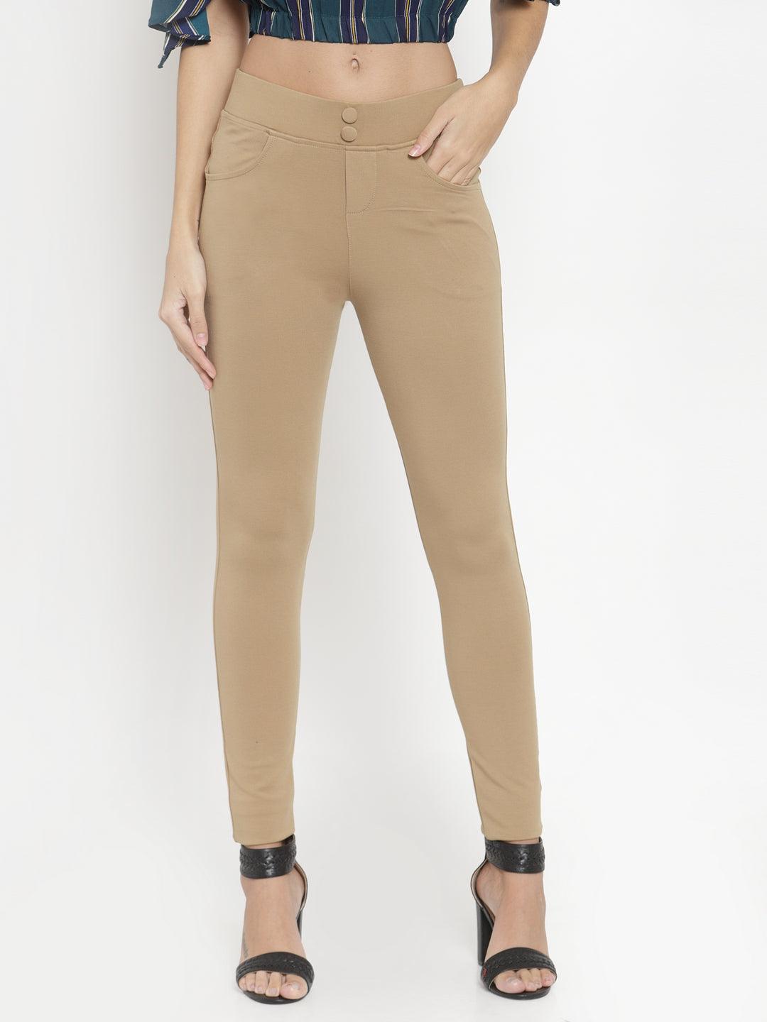 Fawn solid jeggings with button detail, regular fit.