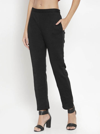 Black woolen pencil pant for women, offering a perfect fit and warmth for winter.