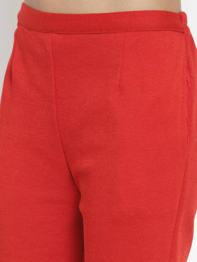 Red woolen pencil pant providing warmth and style for women.