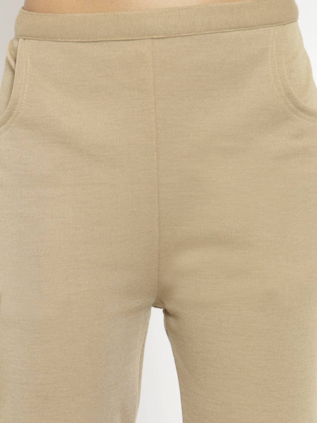 Fawn woolen solid pant for women, perfect for winter warmth.