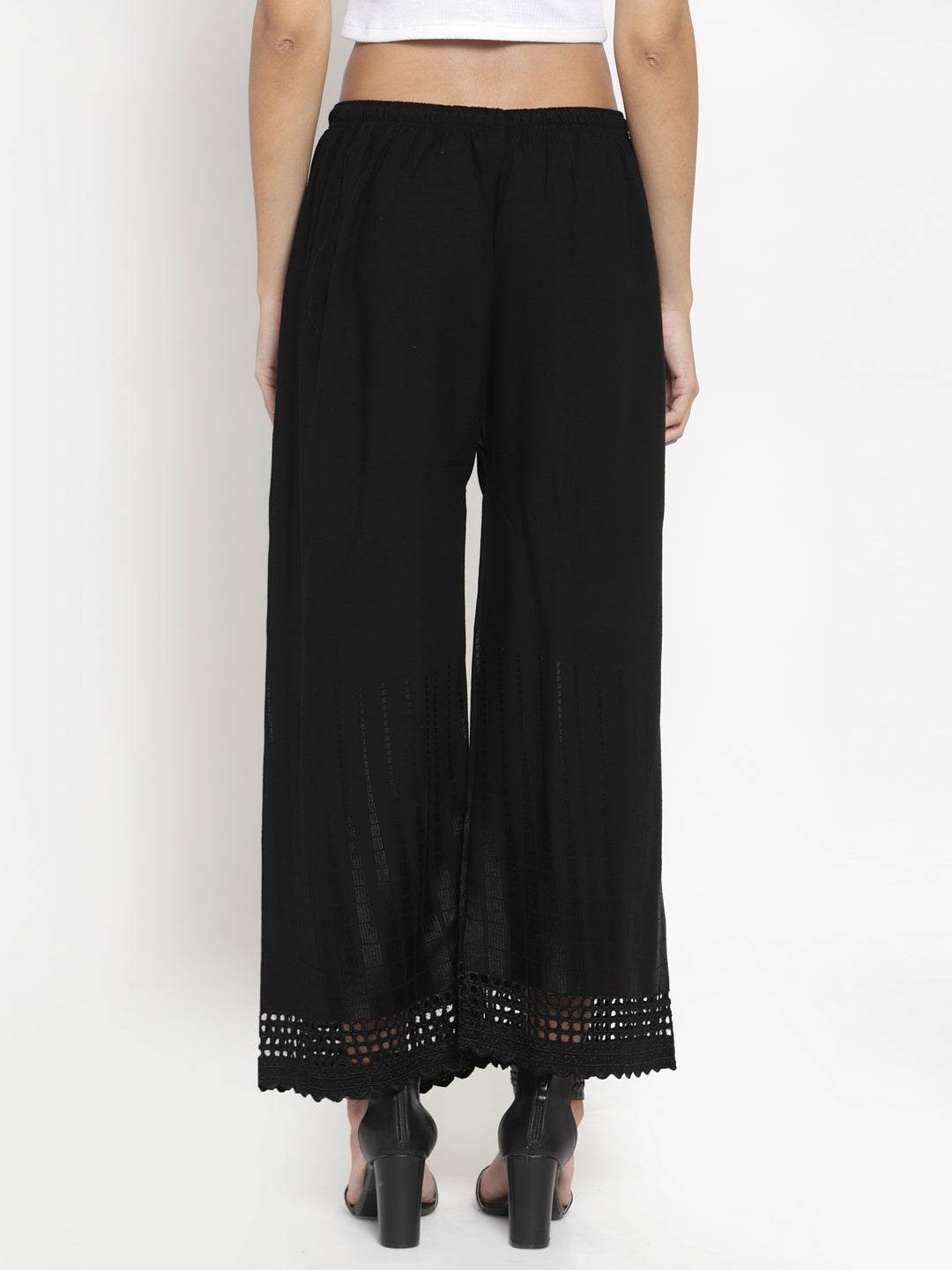 Black self-design rayon palazzo with chikankari detailing.