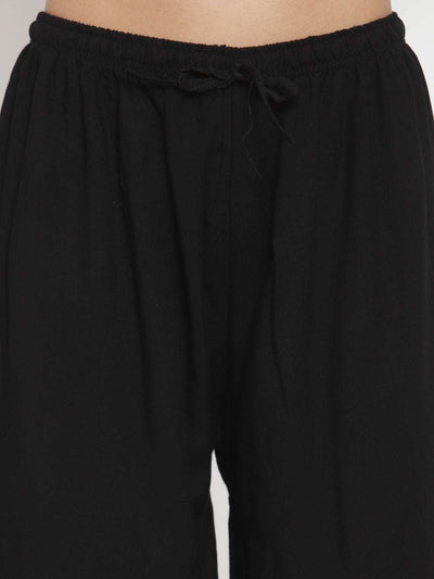 Black self-design rayon palazzo with comfortable fit.