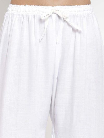 White self-design rayon palazzo with drawstring waist and chikankari detail.