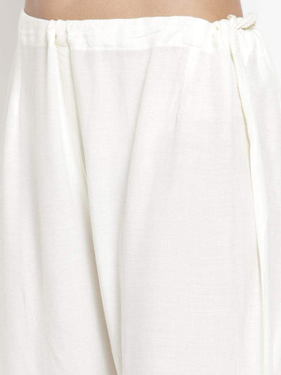 Cream flared solid gharara with elastic waistband detail.