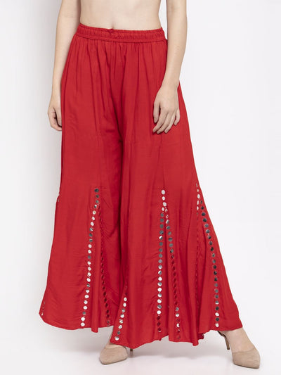Red flared embellished Sharara with mirror details in soft Rayon fabric.