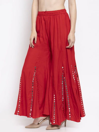 Red flared embellished Sharara with decorative accents and soft Rayon fabric.