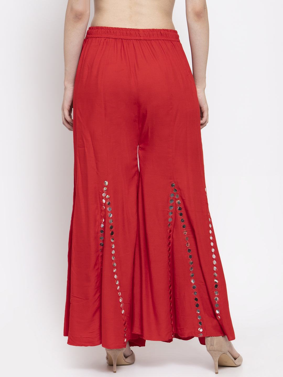 Red flared embellished Sharara in soft Rayon fabric, featuring stylish detail.