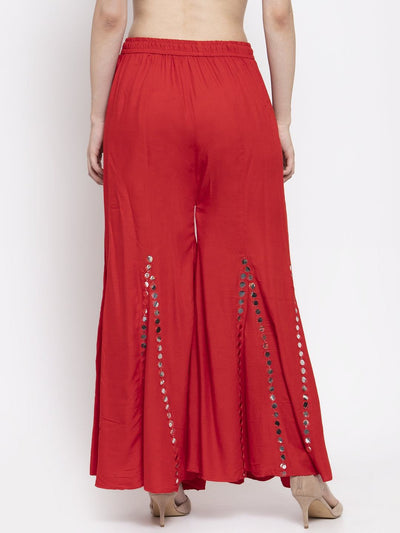 Red flared embellished Sharara in soft Rayon fabric, featuring stylish detail.