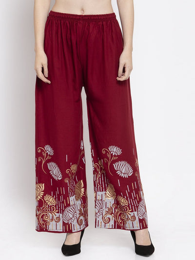 Maroon printed rayon palazzo with elasticated waistband and floral design.