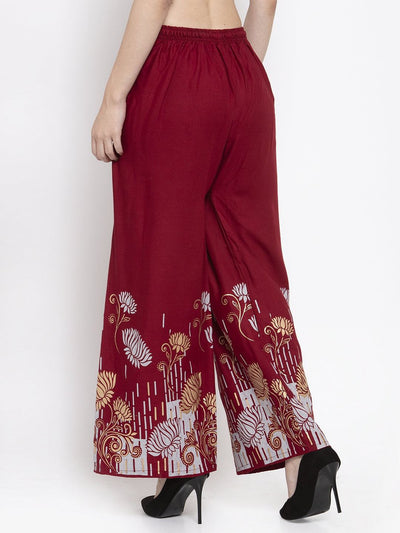 Maroon printed rayon palazzo with elastic waistband and floral design.