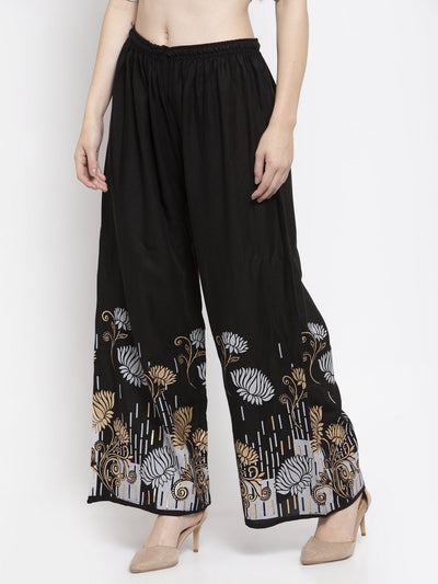 Black printed rayon palazzo with elastic waistband and drawstring.