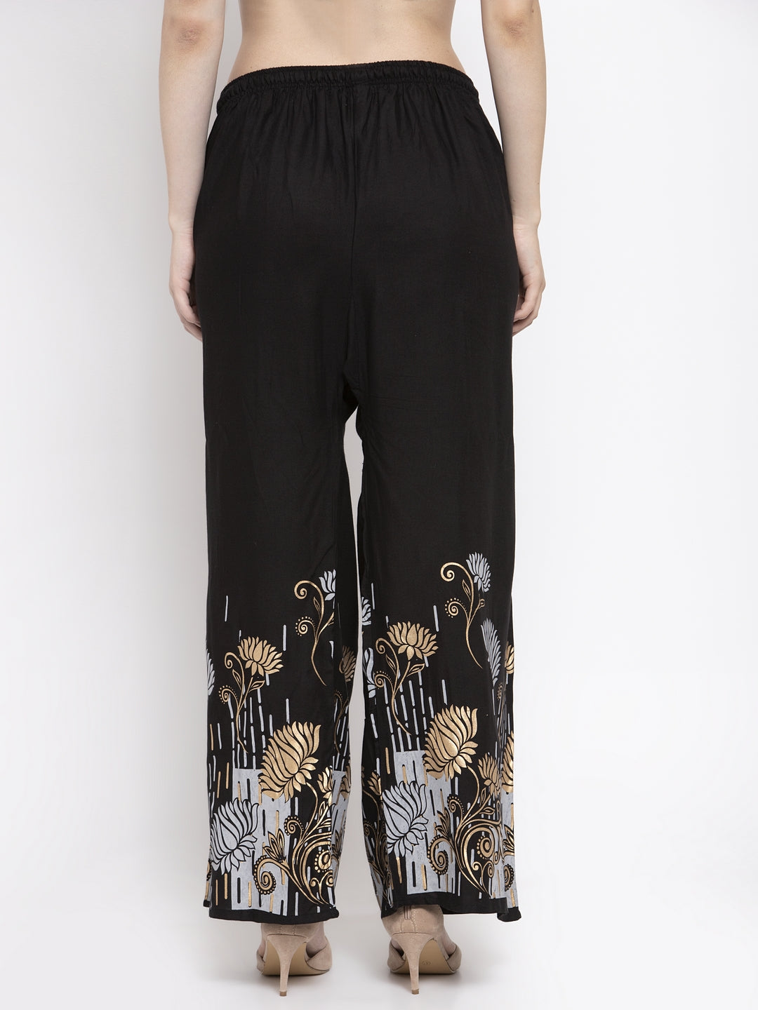 Black Printed Rayon Palazzo with elastic waistband and drawstring.